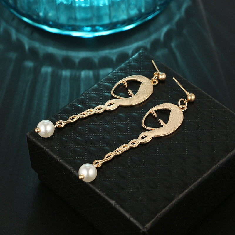 Face earrings Geometric contracted fashion pearl earrings female Fashion women Metal hollow out gold stud earrings for women