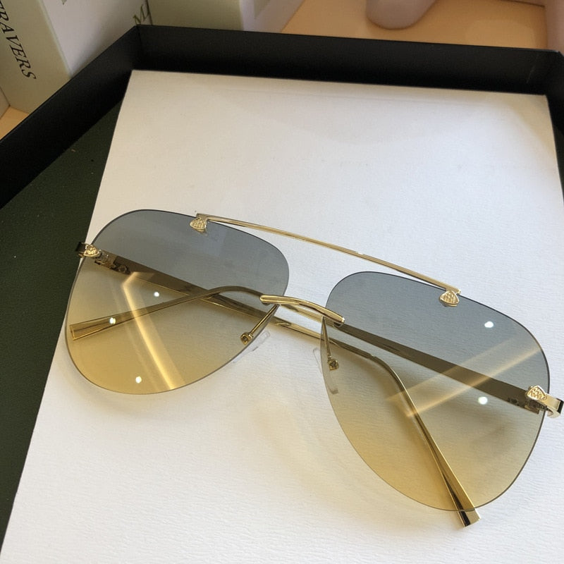 2022  Luxury  Designer Fashion Oval Rimless SunglassesSummer Glasses Fashion Sun glasses For Men Women UV400 Sunglasses